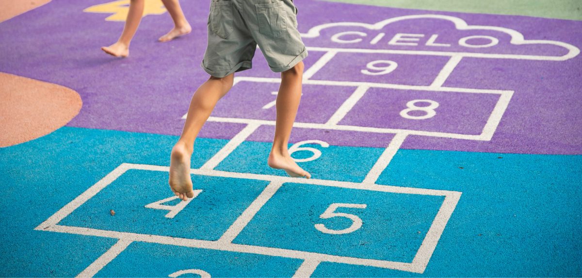 Child playing hopscotch